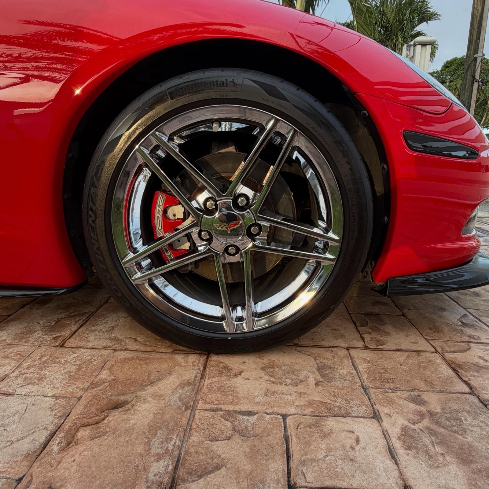 Side profile of a detailed red Corvette